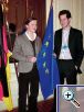 Elisabeth Br�ring (Lohne) und Stephan Hellkamp (Cloppenburg) vor der Europaflagge. (Quelle: AngelikaHauke, M�nsterl�ndische Tageszeitung).